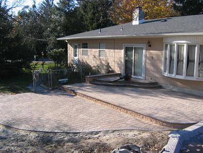 Double Tier Patio with Custom Steps and Landing, Harvest Blend Old Town Cobble, I-pattern with Terrace Wall